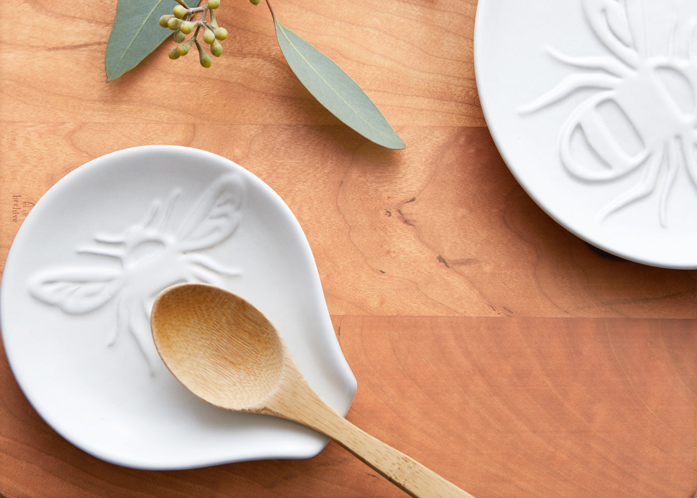 handcrafted ceramic spoon rest for cooking with bee motif